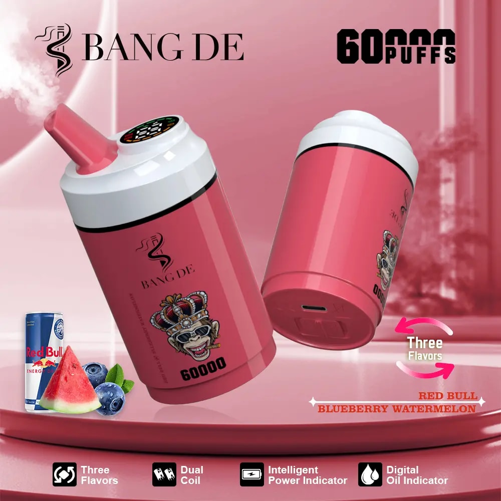 Two pink Bang De disposable vape devices with a monkey wearing a jeweled crown illustration, advertised for 60,000 puffs, featuring Blueberry Watermelon and Red Bull flavors, with icons for three flavors, dual coil, intelligent power indicator, and digital oil indicator on a pink gradient background.