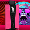 Pink and black Bang King Color 30K Pro vaping device labeled Strawberry Watermelon with a colorful roaring gorilla wearing purple sunglasses illustration in the background.