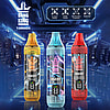Three Bang King Tornado disposable vape devices in yellow peach ice, blue blue razz ice, and red strawberry watermelon flavors displayed against a futuristic blue corridor background with icons highlighting E-liquid display, power display, anti-dry-burn protection, and mesh coil features.