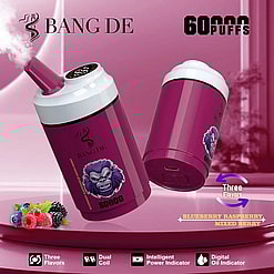 Two maroon and white disposable vape devices with a gorilla logo and '60000' puffs label, surrounded by berries illustration and text indicating three flavors: blueberry, raspberry, and mixed berry, on a pink background