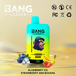 Brightly colored vape device with a gradient from blue to yellow featuring a chimpanzee with a cigar, surrounded by blueberries with ice cubes, strawberries, and bananas, labeled as Bang Leader with 45000 puffs and flavors blueberry ice, strawberry, and banana, set against a beige background with safety and recycling symbols.