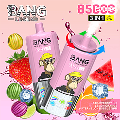 Two pink Bang Legend 3-in-1 disposable vapes labeled Strawberry Ice, surrounded by splashing water, strawberry, watermelon slice, lime, orange, and colorful bubbles, indicating flavors; text highlights 8500 puffs and triple flavor function with colorful arrows