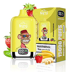 Yellow Bang Box disposable vape device with a graphic of a grinning monkey wearing 3D glasses and a red fez hat, displayed in front of its yellow box labeled '15000 puffs' and 'Strawberry Banana' flavor, surrounded by fresh strawberries and bananas.