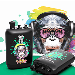 Graffiti-style black bottle mod with a blurred label beside a small black audio device; a person with headphones amid colorful splashes.