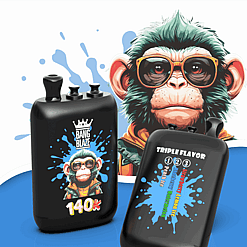 Two black vape bottles with a cartoon monkey logo on a blue splash background; one reads Bang Blaze 140K and the other says Triple Flavor with a flavor list.