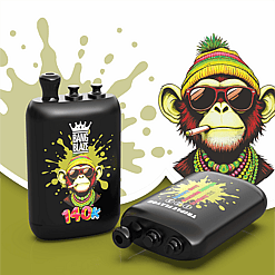 Two black Bang Blaze bottles feature a colorful cartoon monkey with sunglasses on a lime paint-splatter backdrop.