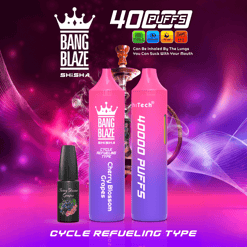 Two gradient purple to pink Bang Blaze shisha devices labeled 'Cherry Blossom Grapes' and '40000 PUFFS' with a hookah in the background, text highlighting 40 puffs, 1000mAh battery, 40ml capacity, and mesh coil, set against a vibrant purple and pink background with smoke effects.