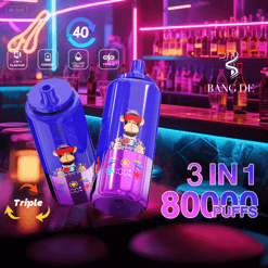 Two blue and purple BANG DE vape devices featuring cartoon monkey designs with red blindfolds, displayed in a neon-lit bar setting with bottles on shelves and neon signs; text highlighting features such as 3 in 1 flavour, 650mAh battery, 20ml volume, Type-C charging, 40 refill cycles, triple puff functionality, and 80000 puffs capacity.