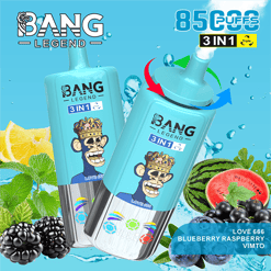 Two blue Bang Legend 3-in-1 disposable vape devices with a crowned cartoon ape on the label, surrounded by images of watermelon, blueberries, blackberries, mint leaves, and lemon slices, set against a splash of water on a light blue background.