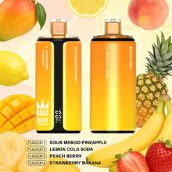 Two bright yellow-orange portable beverage pouches standing side by side, labeled with flavors; surrounding fruits include mango, lemon, pineapple, peach, strawberry, and banana.