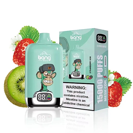 Bang box disposable vape device with a cartoon angry monkey wearing a fur hat on the turquoise body, displayed alongside its matching box with images and text indicating 15000 puffs, strawberry kiwi flavor, and a nicotine warning, with sliced kiwi and strawberries in the background