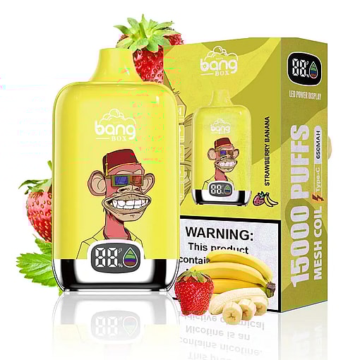 Yellow Bang Box disposable vape device with a graphic of a grinning monkey wearing 3D glasses and a red fez hat, displayed in front of its yellow box labeled '15000 puffs' and 'Strawberry Banana' flavor, surrounded by fresh strawberries and bananas.